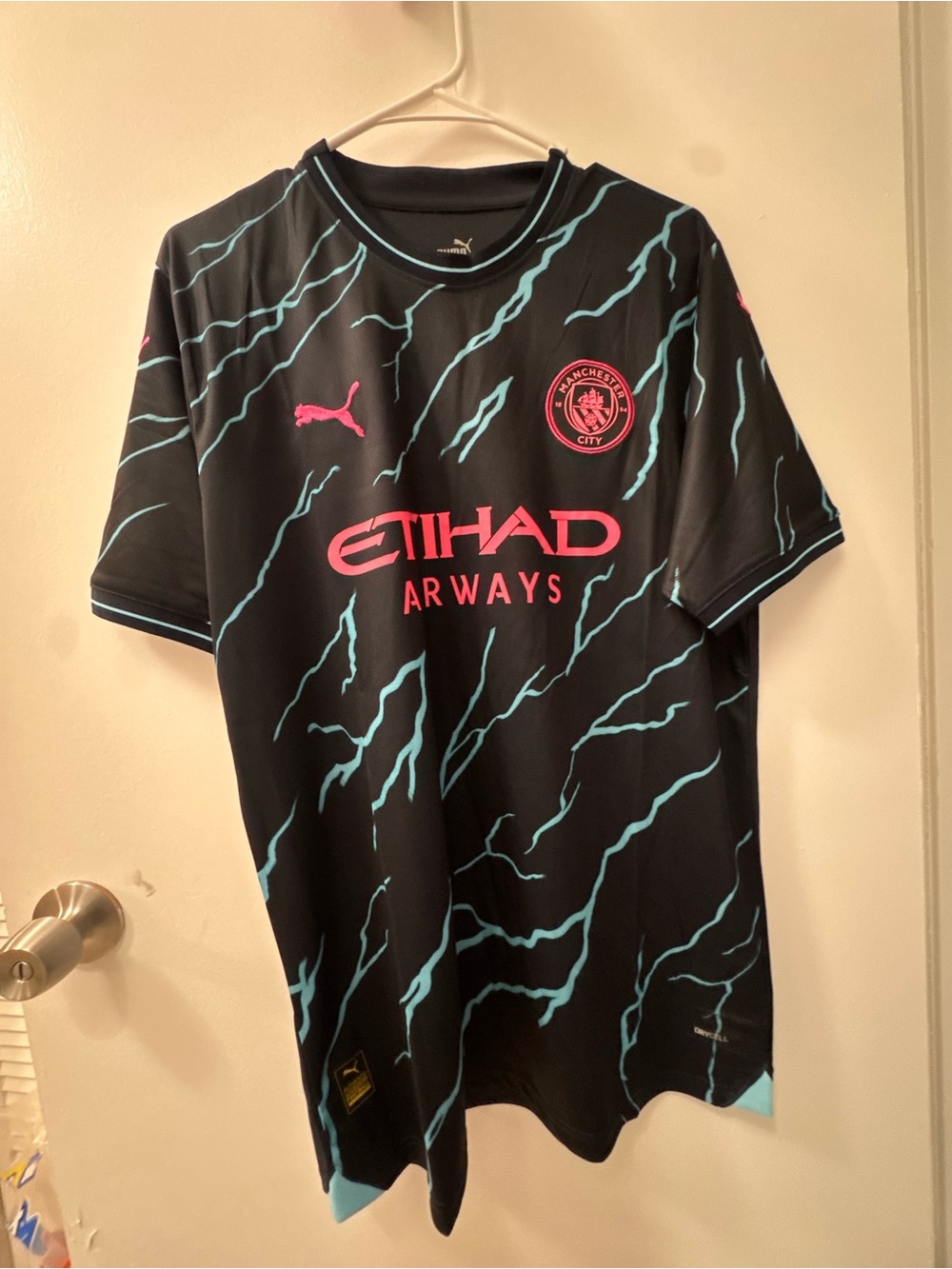 Puma Black Jersey with Teal Lightning & Pink Logos Man City